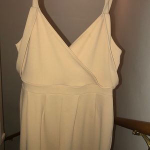 Beige jumpsuit with cute side hanging straps